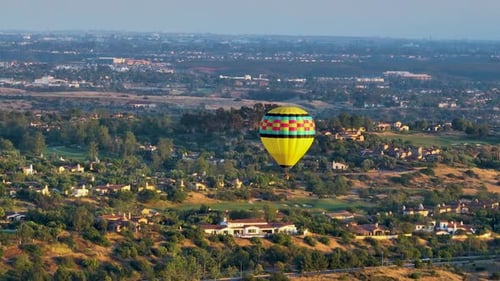 Hot Air Ballooning Over Upscale Neighborhood