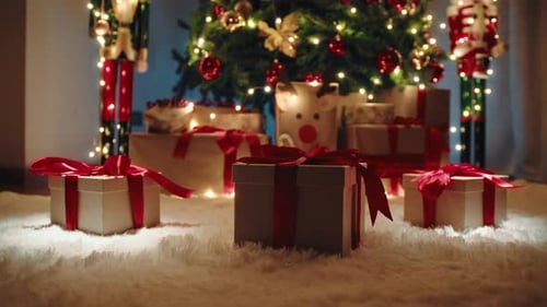 Christmas Presents Under a Decorated Tree at Night