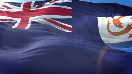 Realistic Anguilla Flag Waving in the Wind with Blue Sky Background
