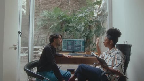 Colleagues Working on Software Development in Home Office