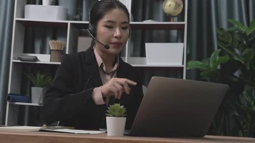Woman Working at Home Office on Laptop