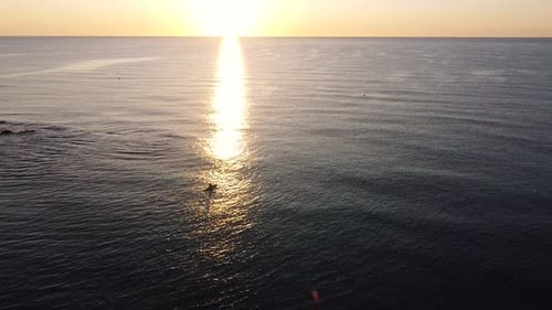 Kayak at the beach drone view. Kayaker trolling fishing from aerial point of view at Mediterranean s
