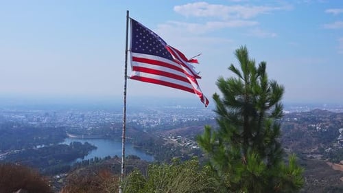 United States Flag Waving over Los Angeles