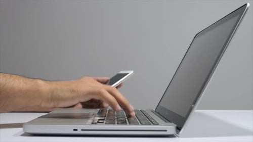 Using Phone and Laptop, Side View