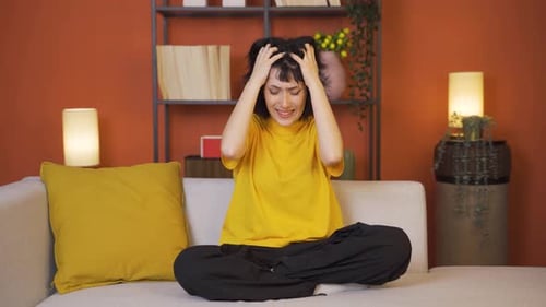 Young woman having a nervous breakdown in front of the camera.