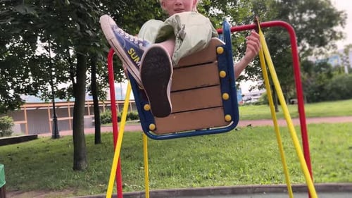 Girl Swinging on Swing in Park Child Having Fun Playing on Outdoor Public Playground Kids Play on
