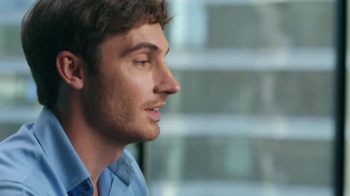 Man Talking in Office Meeting Close Up