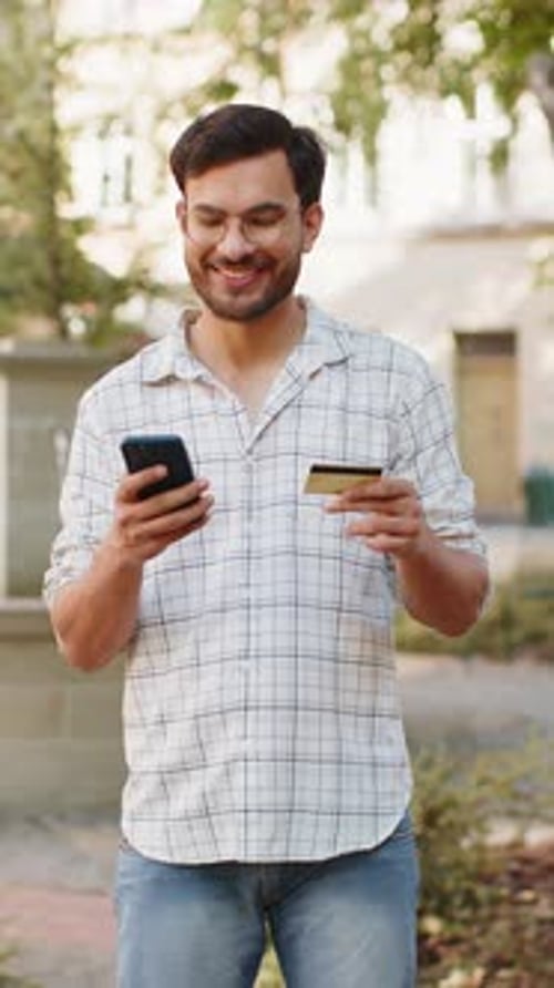 Man Shopping Online Using Credit Card