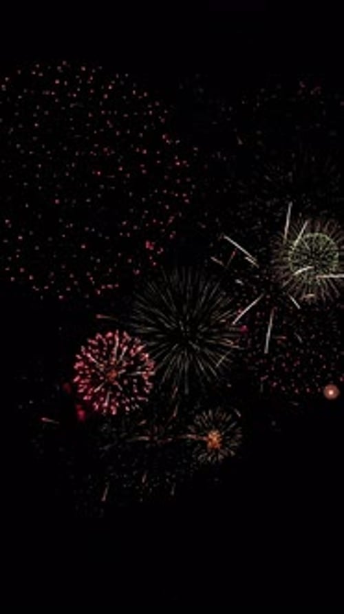 Real Fireworks Explosion Smoke firework in night sky 4K New Year. national holiday, Background. Birt