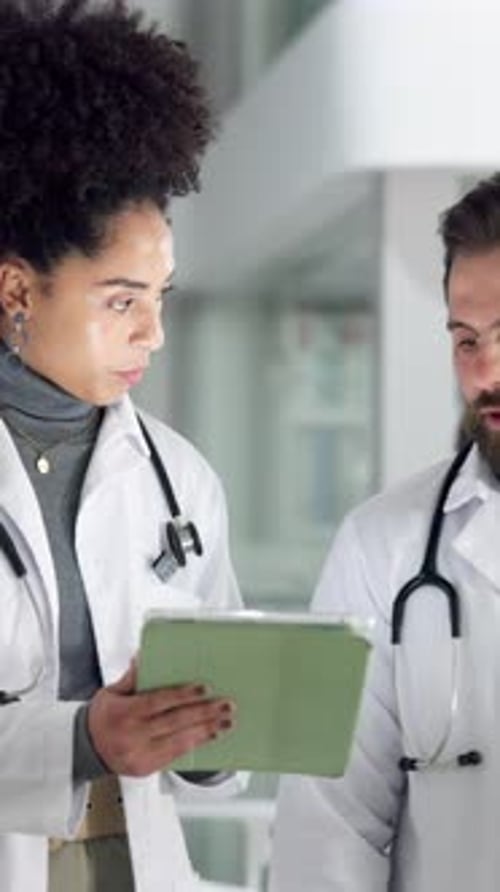 Hospital, meeting and doctors on tablet talking for online results, medical service and advice