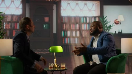Two Men Discussing in an Elegant Library Setting