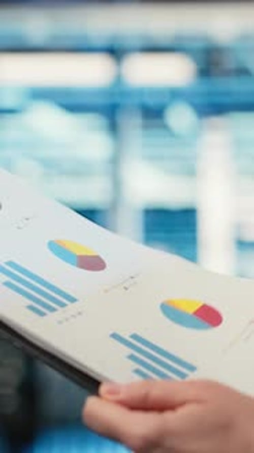 Vertical Video Data Center Admin Verifying Infrastructure Status with Clipboard Files Closeup