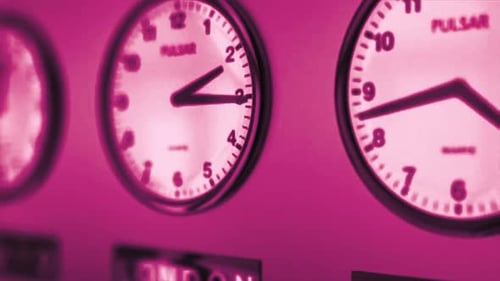 Modern Clocks Panning Across Different World Time Zones