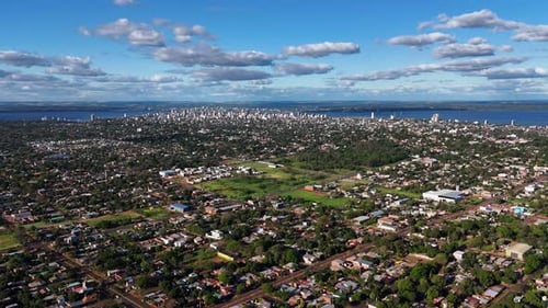 Aerial hyperlapse showcasing the charming city of Posadas, Misiones, Argentina, against a backdrop o