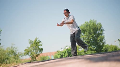 Street Dance Rehearsal Performer Practicing Sunny Pavement Athletic Dancer Testing Moves Outdoors