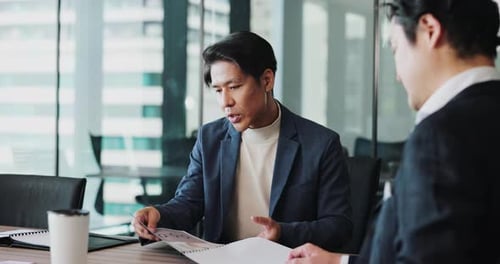 Japanese, business and men with documents in office of finance report, planning budget