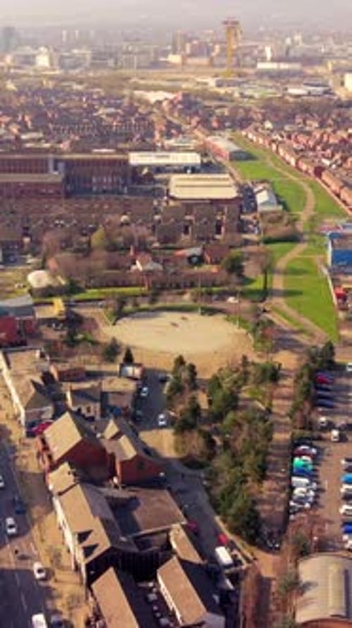 Rotating 60FPS vertical social ratio aerial video of C.S. Lewis Square in East Belfast