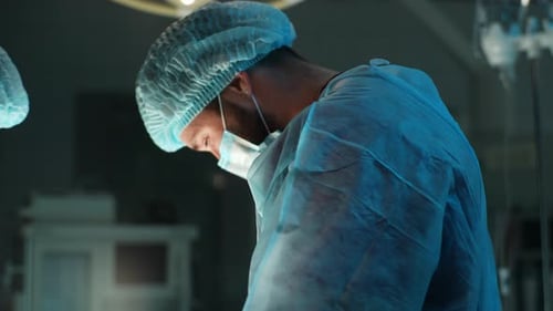 Closeup Process Team of Professional Medical Surgeons Performs Surgical Operation in Modern Hospital