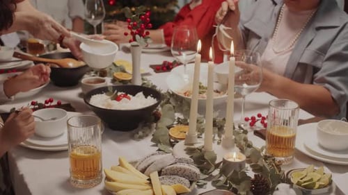 Holiday Feast With Family and Friends Around Table