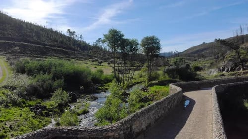 Beautifull Nature Landscape with old Roman bridge. Drone footage with slow foward and up movement.