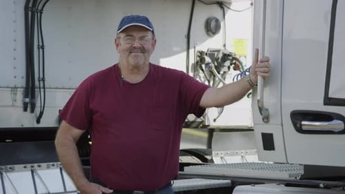 Truck driver portrait a man of the highway delivering freight in america
