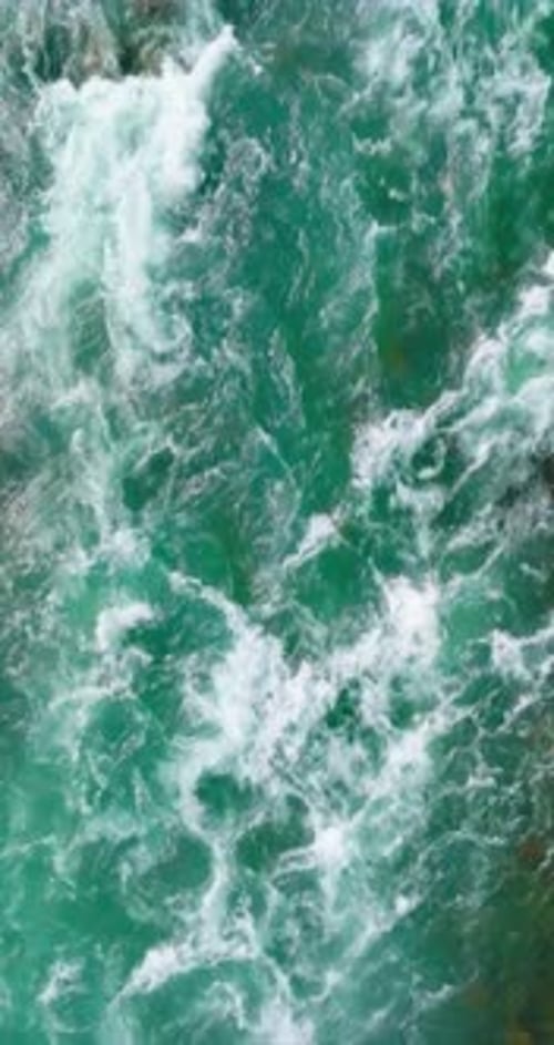 Top Down View of Fast Moving River with Rapids