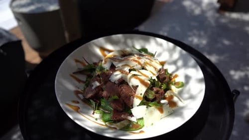Delicious Looking Steak Salad On a White Plate