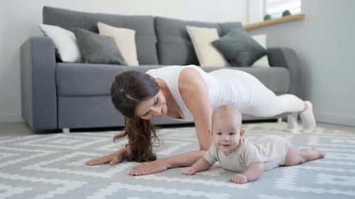 Woman Mother Sport Fitness Home with Little Baby Mom Exercising Works Out Yoga Together Kid Child
