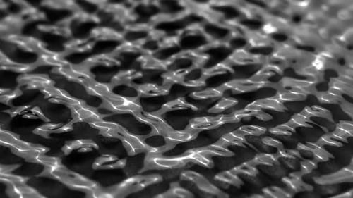 High Contrast Abstract Fluid Surface Ripples Grayscale Loop