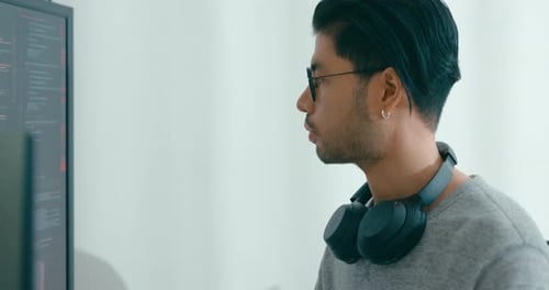 Closeup young adult Asia male freelance eyeglasses typing write prompt AI bot IT app program nomad.