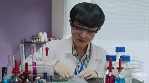 Scientist Working in a Modern Laboratory Setting