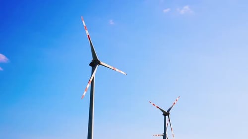 Wind Turbines Spinning on Clear Day