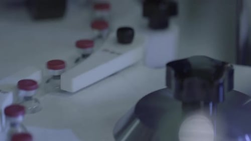 Automated Pharmaceutical Manufacturing Process with Small Vials