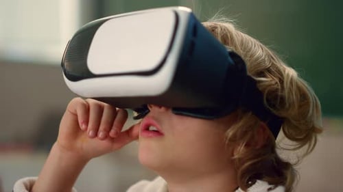 Excited Boy Learning with Vr Headset