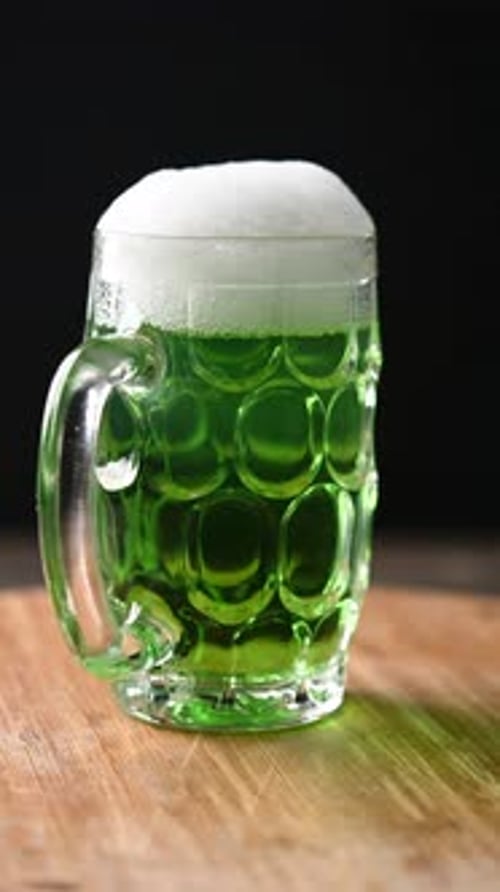Green beer mug with foam for St. Patrick’s Day