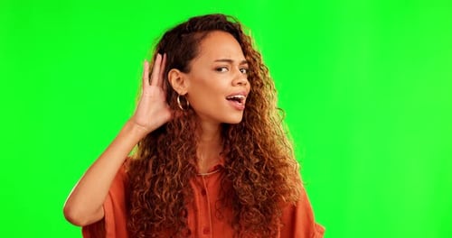 Girl, listen and hand by ear by green screen with face, question or doubt for gossip, story or news