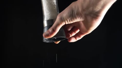 Salt Mill on a Black Background