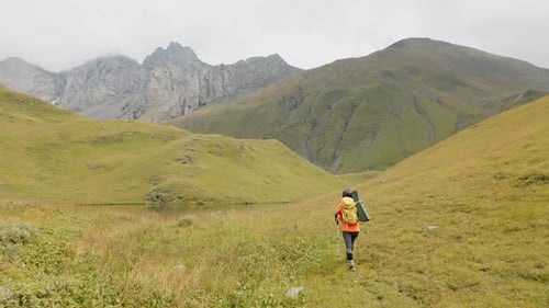 Woman Hiker In Scenic Caucasus Mountains, Georgia (Tracking)