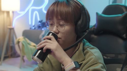 Chinese Female Player Chatting with Companions in Video Game