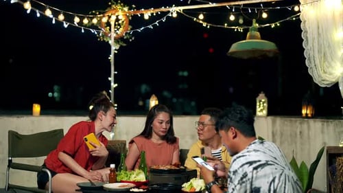 Friends Celebrate at Rooftop Evening Party
