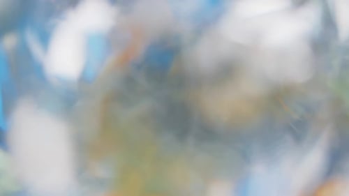 Vidéo de fuite de lumière multicolore sur fond noir, stylisant les transitions vidéo, effet bokeh