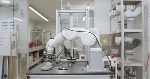 Robotic Arm Moves Parts in Science Lab