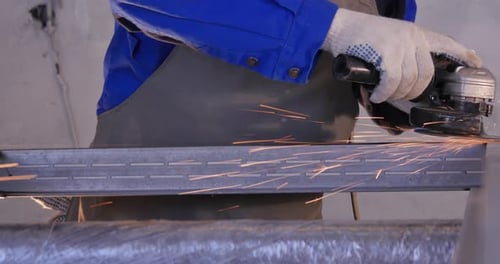 Grinding Tool Creating Sparks in Metalwork Job