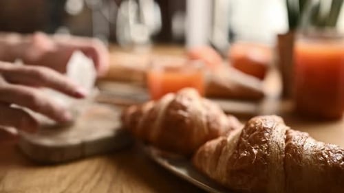 Breakfast Food Spread with Golden Brown Croissants
