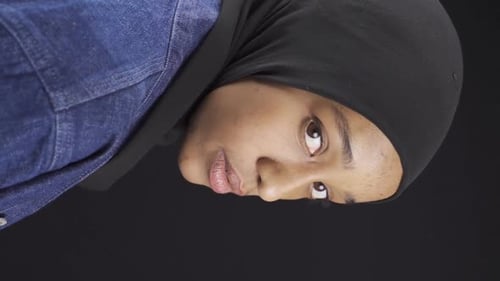 Close Up of Woman with Hijab Gazing Forward