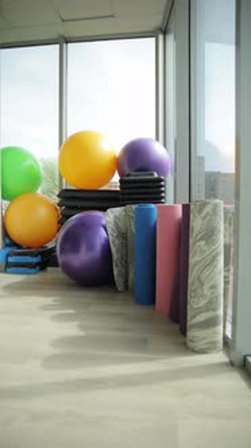 Various Gym Equipment by Large Window