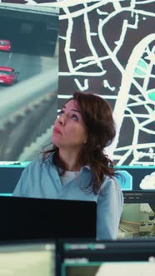 Woman Working in Tech Surveillance Security Data Center