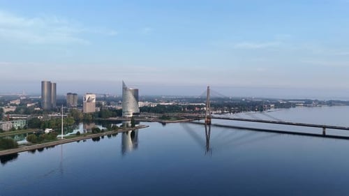 Aerial View of the Daugava River and Vansu Bridge in Riga Early in the Morning at Dawn on a Clear