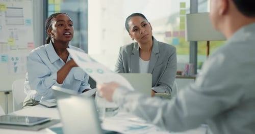 Paperwork, discussion or analyst team with laptop in office for meeting
