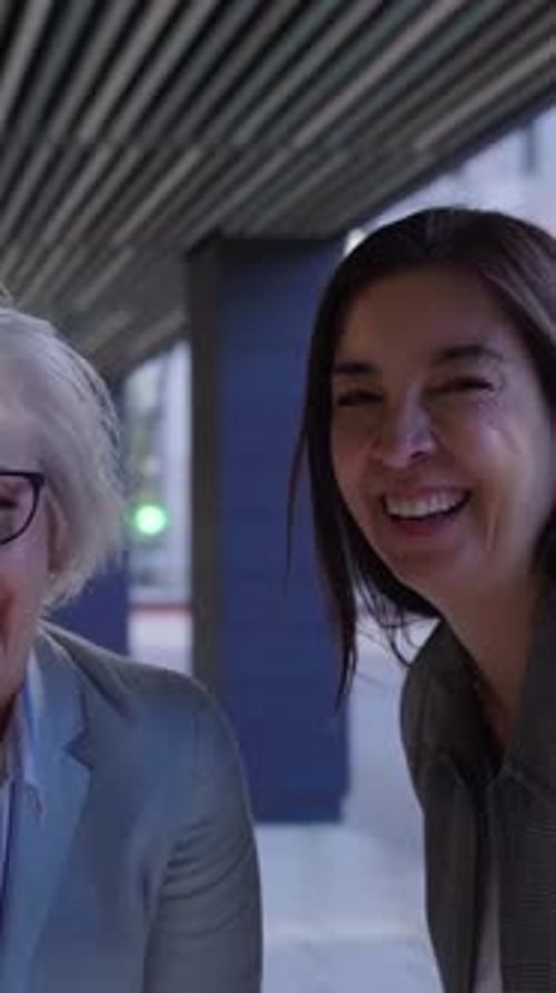 Cheerful Group of Mature Businesswomen Gathering Outside Work Office Laughing Together